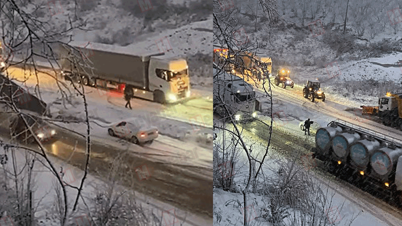 D-140'da zor anlar! Buzlanan yolda traktörler sürücülere yardım etti